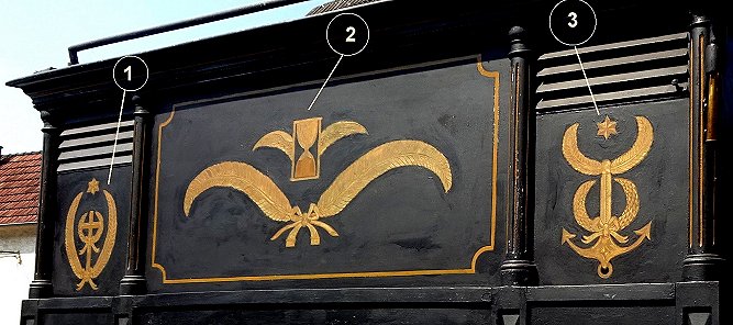 Symbole auf dem Leichenwagen